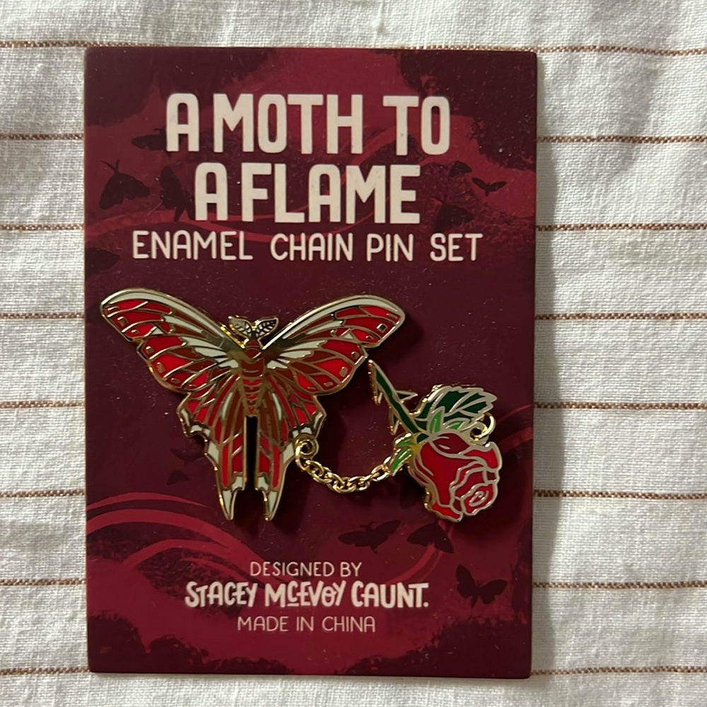 A Moth To Flame enamel chain pin set